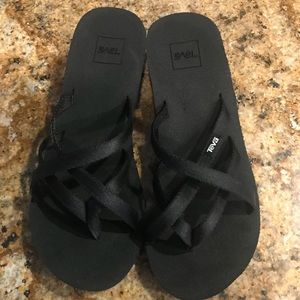 Never worn Teva black size 8 flip flops